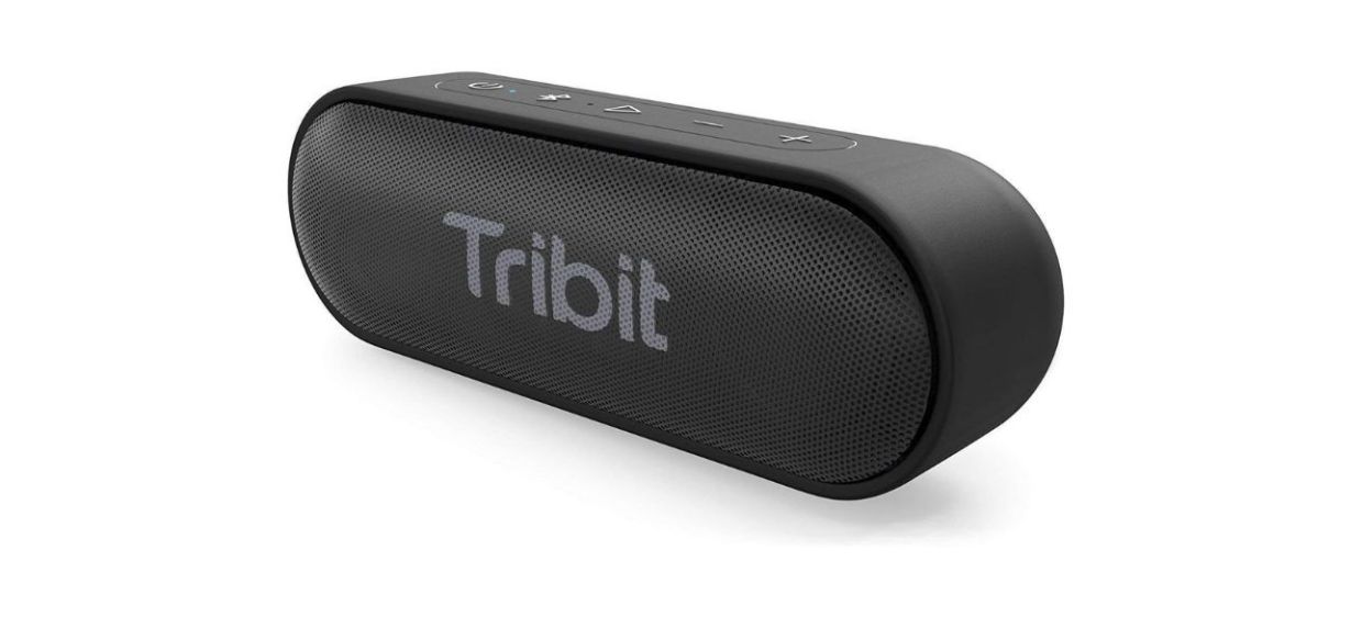 a black pill-shaped Bluetooth speaker on a white background a black pill-shaped Bluetooth speaker on a white background